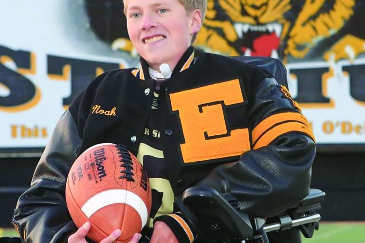 Stadium. Noah Marker wears his letterman jacket in front of the Excelsior Springs Tiger MARKER FAMILY | Submitted
