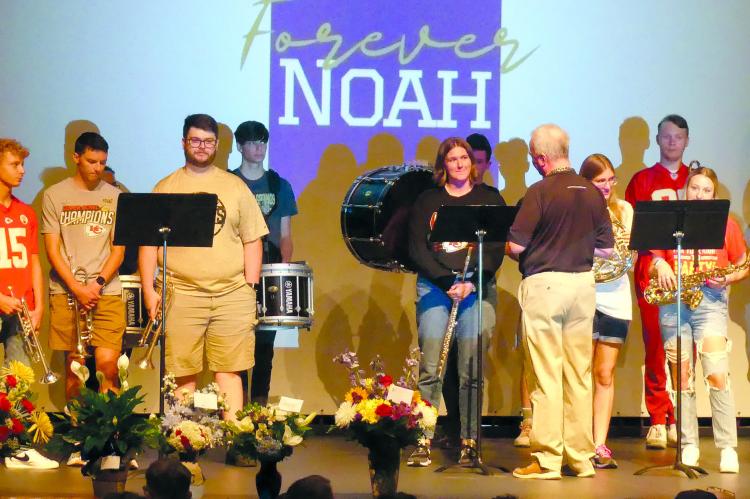 The Excelsior Springs Alumni band plays the alma mater for the Markers at Noah’s funeral service. ELIZABETH BARNT | Staff
