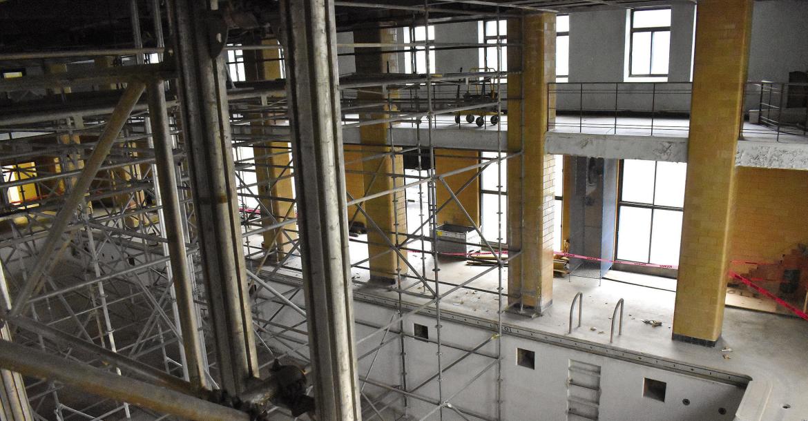 THE ONLY REMAINING POOL in the Hall of Waters is filled with $30,000 of scaffolding. The pool will be the next part of the construction, where issues such as delamination of the concrete ceiling will take place. TARA ALTIS | Staff