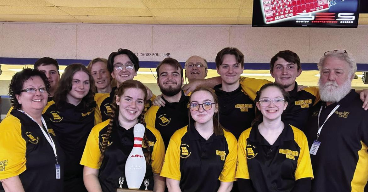 MEMBERS OF the Excelsior Springs High School bowling club display their trophy from December tournament competition at Summit Lanes in Lee’s Summit. From left, front row, coach Teresa Ferrell, Olivia Deere, Olivia Smith, Quinlynn Davis; back row, Kamdyn McAndrews, Brody Hurla, Colt Bowman, Cole Dickey, Joshua Oldham, coach Jerry Ferrell, David Falconer, Andrew DeOrnellis. coach Sam Stanton. SARAH OLDHAM | Submitted